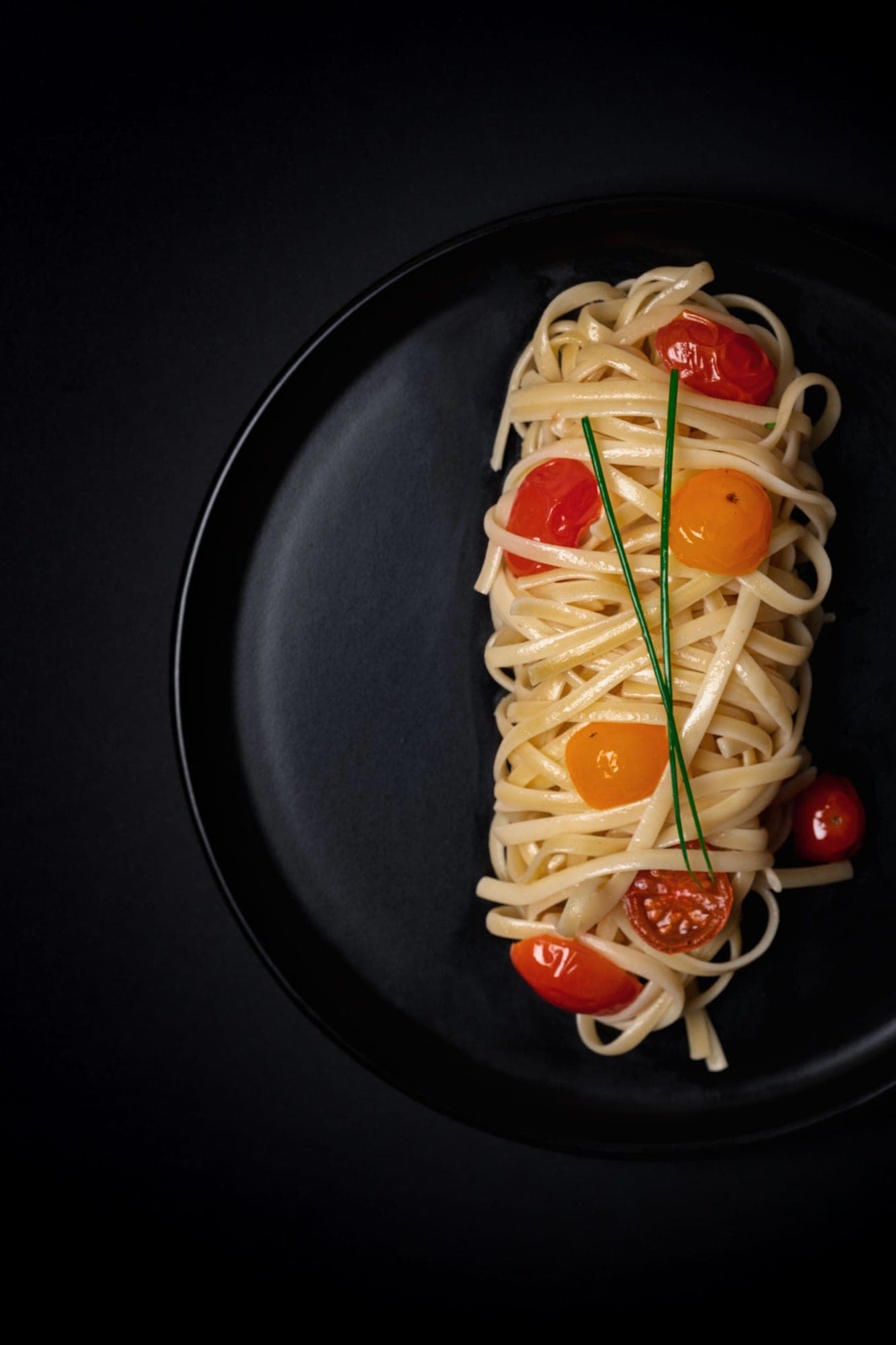 A plated pasta dish from Artha's Italian menu